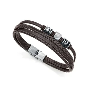 A stylish braided brown leather bracelet featuring silver charms and a sleek clasp, perfect for casual or edgy outfits.