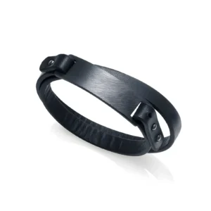 A sleek, black leather bracelet with a smooth surface and a stylish clasp, resting on a reflective white background.