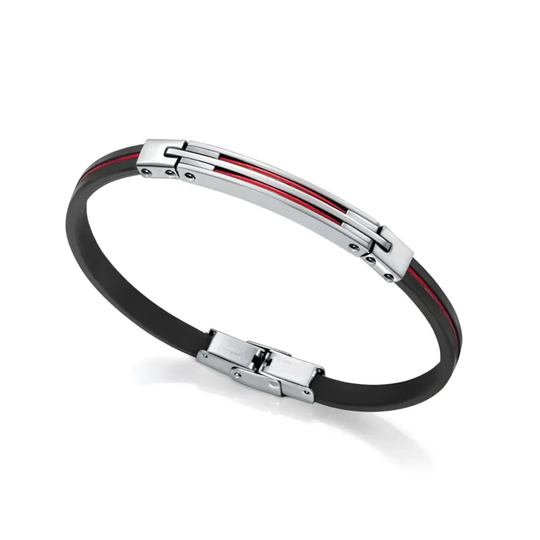 Eleganta melna aproce ar sudraba akcentiem un neuzkrītošām sarkanām svītrām, demonstrējot modernu un stilīgu dizainu.