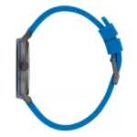 Side view of a sleek watch featuring a metallic gray face and a vibrant blue silicone strap.