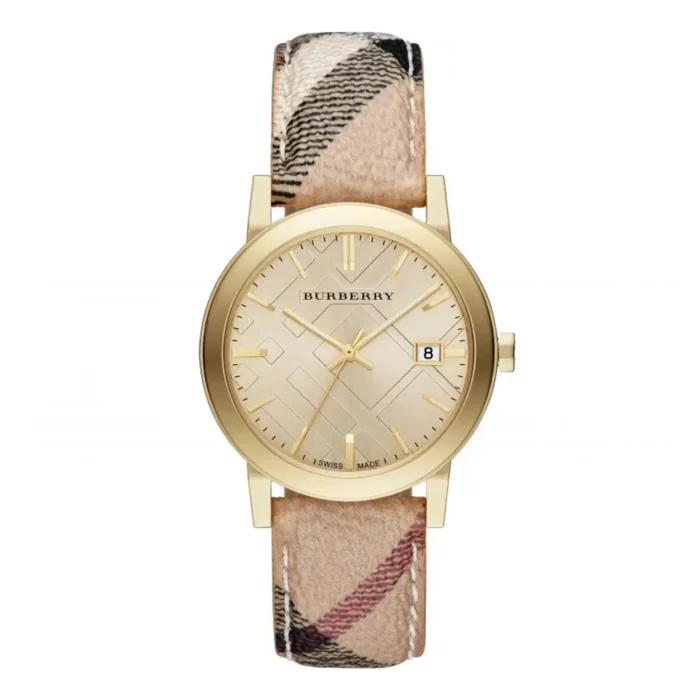 Gold Burberry watch with a textured dial and date function, featuring a patterned fabric strap in beige and brown tones.