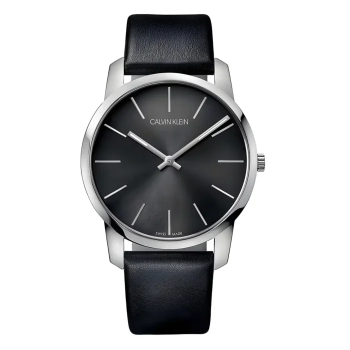 A sleek Calvin Klein watch featuring a black dial, silver hands, and a black leather strap, exuding modern elegance.