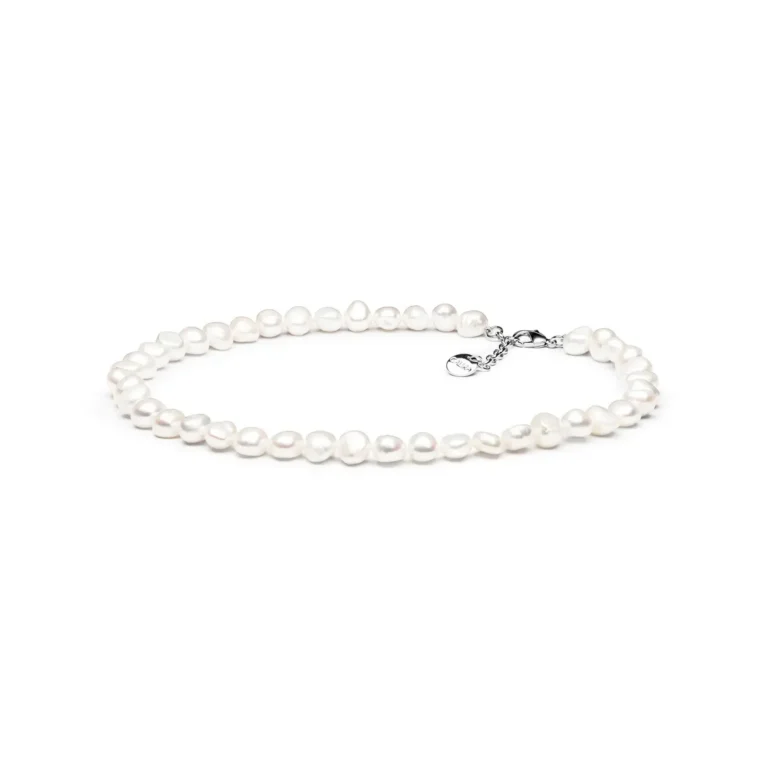Elegant white pearl necklace with irregular shapes, featuring a silver clasp and chain extension for adjustable fit.