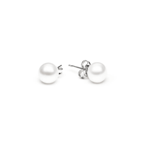 A pair of elegant white pearl stud earrings with silver posts, resting on a clean white background
