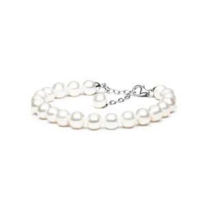 A delicate pearl bracelet with a silver clasp and adjustable chain, featuring luminous white pearls arranged neatly in a single strand.