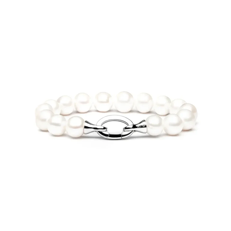 Elegant pearl bracelet with a silver clasp, featuring lustrous white pearls in varying sizes arranged in a delicate design.