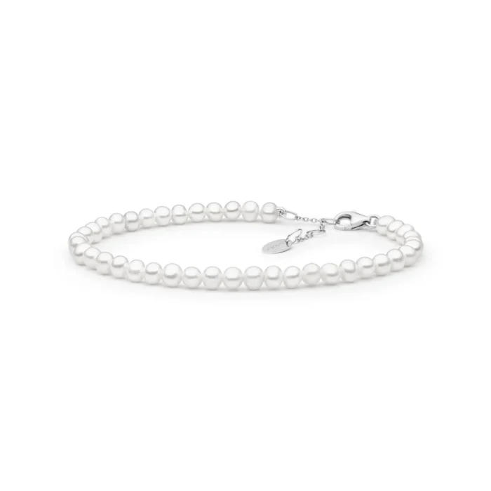 Elegant white pearl bracelet with a silver clasp and adjustable chain, showcasing a classic and timeless design.