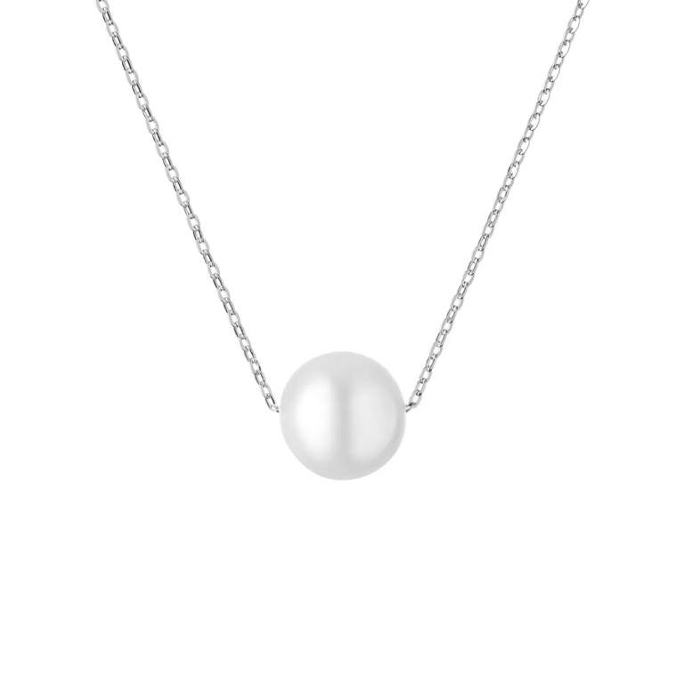 Simple silver necklace featuring a single lustrous white pearl as the centerpiece on a delicate chain.