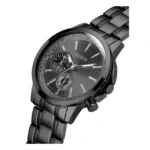 GW0490G3-2 En elegant, svart Guess-klocka med blank urtavla, kronograffunktion och ett stilrent metallarmband. Stilren klocka i detalj.