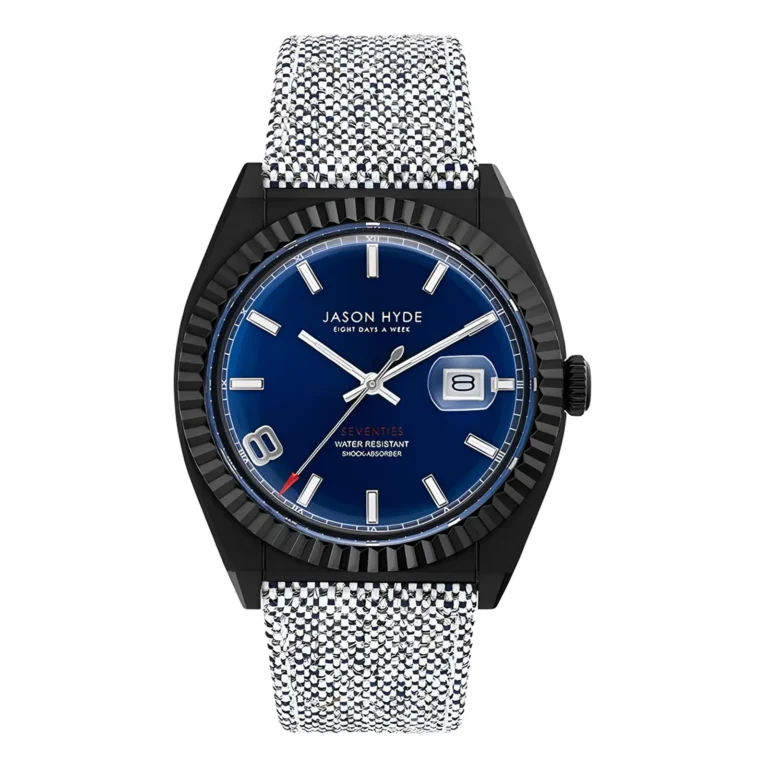 A stylish black watch with a blue face, silver accents, and a textured mesh strap, featuring a date display at 3 o'clock.