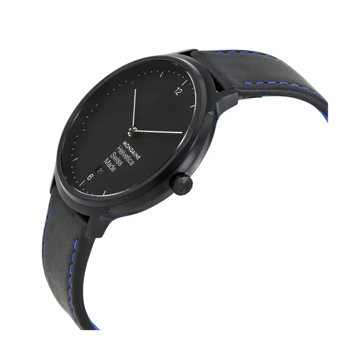 A sleek black Mondaine watch with a minimalist design, featuring a round face, silver hands, and a black leather strap accented with blue stitching.