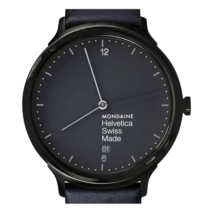 Close-up of a Mondaine Helvetica Swiss Made watch with a sleek black face, minimalist design, and navy leather strap.