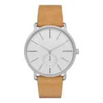 SKAGEN SKW6215 Silver Skagen watch with a minimalist white face, thin hour markers, and a light brown leather strap.