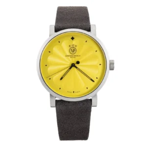 A vibrant yellow watch with a textured dial and black hands, paired with a dark brown suede strap. Designed by Stefano Braga.