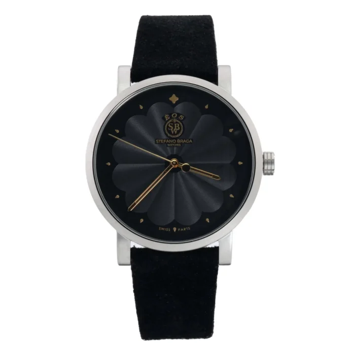 STEFANO BRAGA EOS1000B-NR-05KNR Sleek black watch by Stefano Braga, featuring a textured round face, gold accents, and a black suede strap. Elegant and modern design.