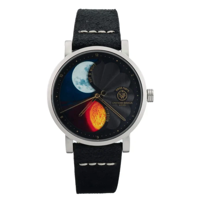 A stylish watch featuring a celestial design with the sun and moon on a dark dial, set on a black suede strap.