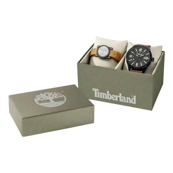 A Timberland watch gift set featuring two watches in a green box with the Timberland logo, showcasing a black and a brown strap watch.