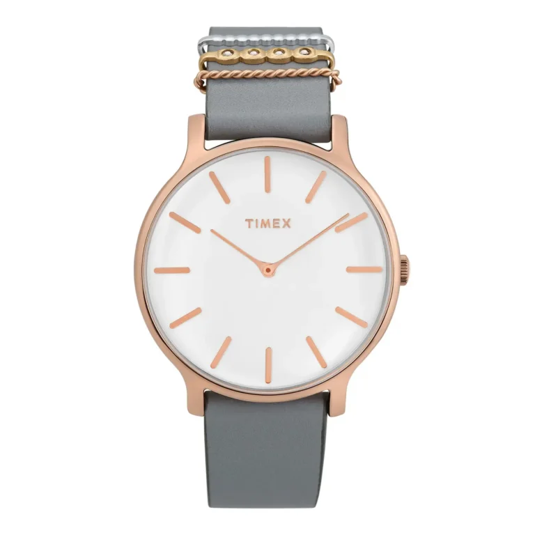 A stylish Timex watch featuring a white dial, rose gold accents, and a sleek gray strap, perfect for modern elegance.