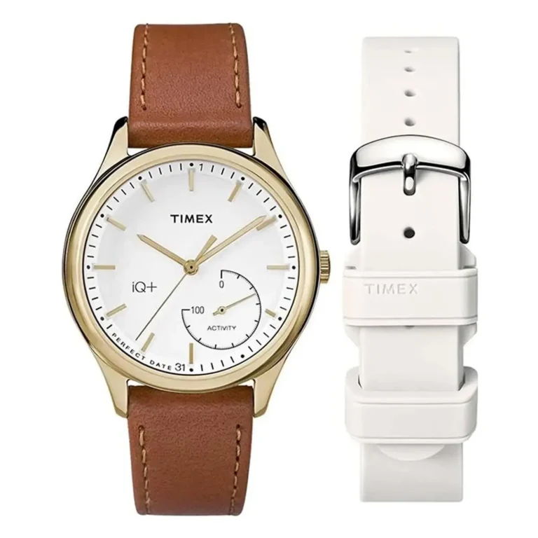 Timex iQ+ watch with a gold-tone case, white dial, brown leather strap, and a white interchangeable strap on the side.