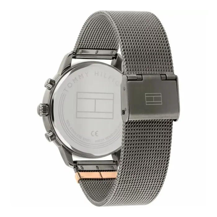 TOMMY HILFIGER 1782304-2 Tommy Hilfiger vyriško laikrodžio galinis vaizdas su elegantiška juoda nerūdijančio plieno tinklelio apyranke ir minimalistiniu dizainu.