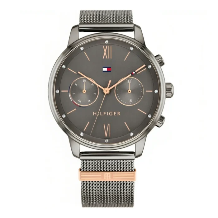 TOMMY HILFIGER 1782304 Stilingas vyriškas laikrodis su tinkleliu dirželiu, tamsiu ciferblatu ir elegantiškomis rožinio aukso detalėmis.