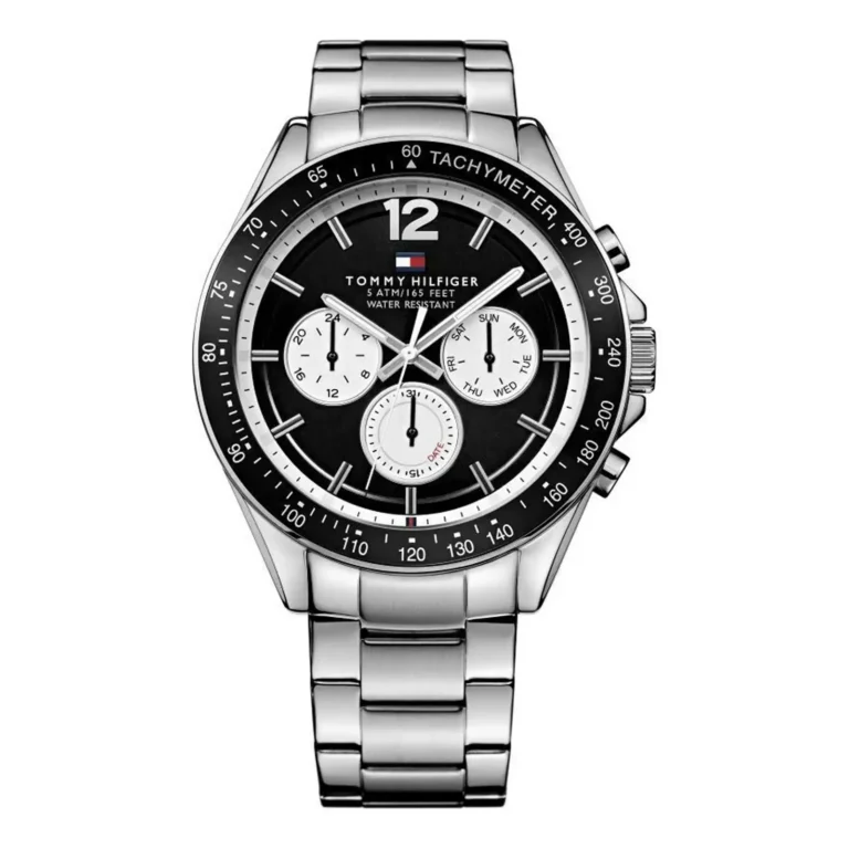 Stylish Tommy Hilfiger stainless steel watch with a black dial, three sub-dials, and tachymeter, featuring a silver metal bracelet.
