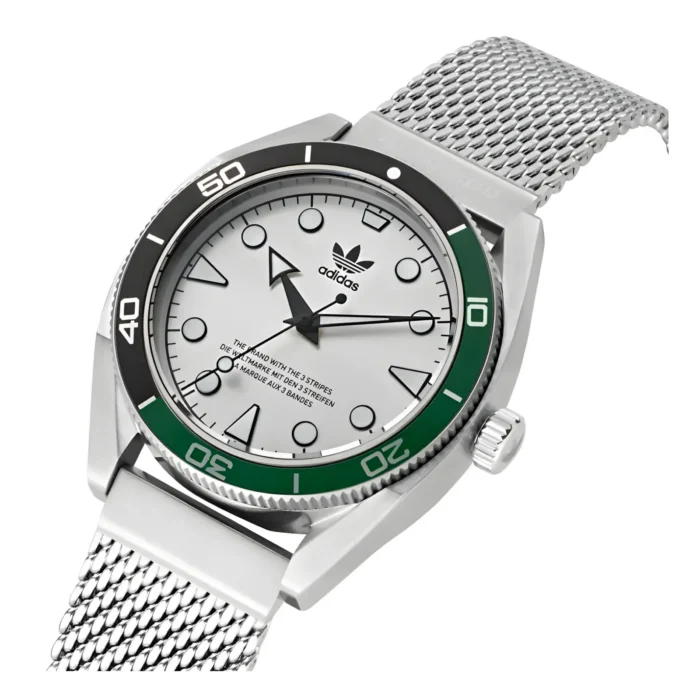 Silver Adidas watch with a white dial, green bezel, and mesh band, featuring bold hour markers and the iconic three stripes logo.