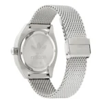 Silver Adidas watch with a mesh band, featuring the iconic three stripes logo on the back casing. Elegant and sporty design.