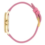 Side view of a gold-tone wristwatch with a round face and a pink leather strap, featuring a crown and buckle closure.