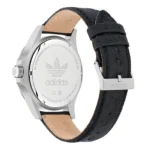 Black leather strap watch with stainless steel back, featuring the Adidas logo, showcasing a sporty yet stylish design.