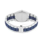 Close-up of a Calvin Klein watch featuring a silver case and a blue rubber strap, showcasing its sleek design and branding.