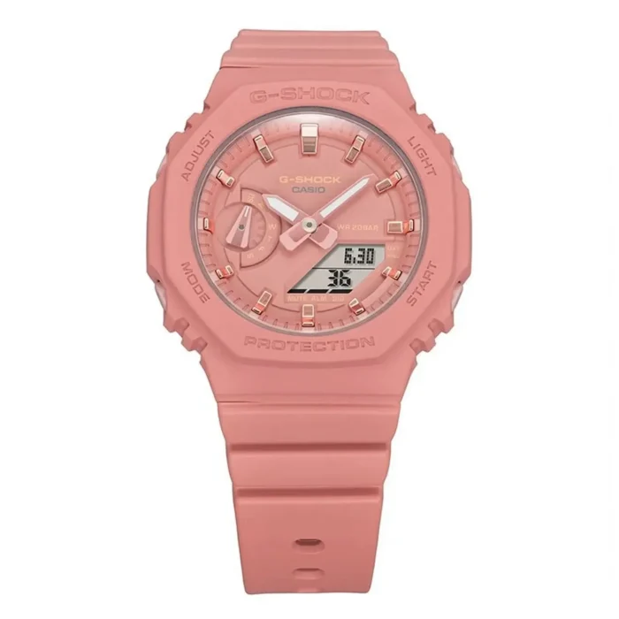 Close-up of a pink Casio G-Shock watch featuring a digital display, analog hands, and a sturdy rubber strap.