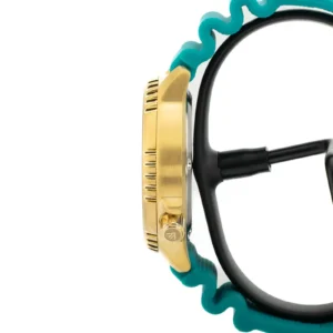 Close-up of a stylish watch with a gold-tone case, accented by a teal wavy strap, showcasing its unique design and craftsmanship.
