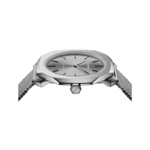 Close-up of a silver octagonal watch featuring a minimalist gray dial, mesh band, and hexagonal crown for adjusting time.