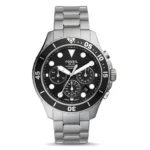 A stylish Fossil watch with a black dial, silver stainless steel band, and multiple chronograph subdials, water-resistant up to 100 meters.