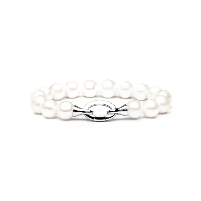 Elegant pearl bracelet with a silver clasp, featuring lustrous white pearls in varying sizes arranged in a delicate design.