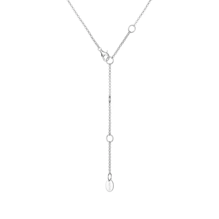 A sleek silver necklace featuring a delicate chain design with a central drop and a branded tag, set against a white background.