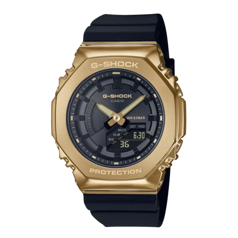 Gold G-Shock wristwatch with a black dial and rubber strap, featuring digital display and analog time indicators.