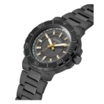 A sleek black Guess watch featuring a stylish gold and silver dial, with a stainless steel bracelet and a sporty design.