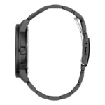 A sleek black wristwatch viewed from the side, featuring a chunky strap and two dial buttons for time adjustment.
