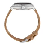 Side view of a stylish watch featuring a polished silver case, dark dial, and a light brown leather strap with a silver buckle.