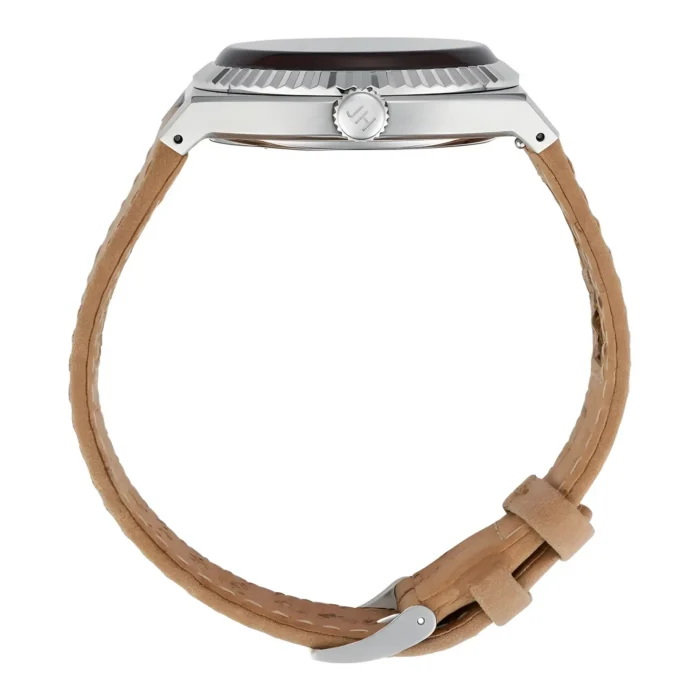 Side view of a stylish watch featuring a polished silver case, dark dial, and a light brown leather strap with a silver buckle.
