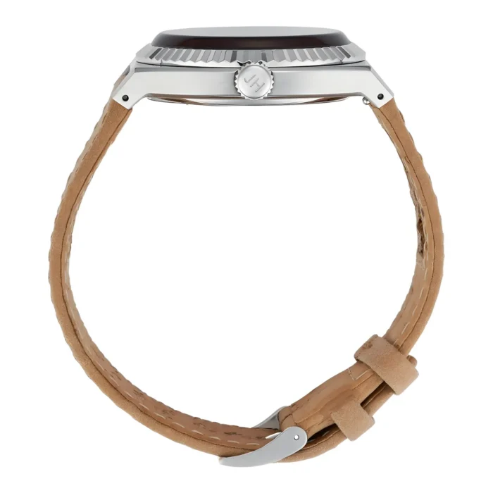 Side view of a stylish watch featuring a polished silver case, dark dial, and a light brown leather strap with a silver buckle.
