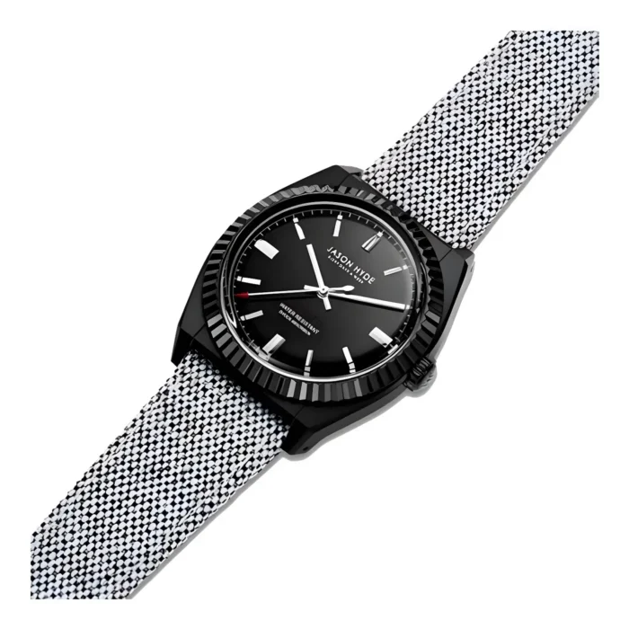 Stylish black watch with a polished bezel and intricate black-and-white patterned strap, featuring a minimalist dial with silver markers.