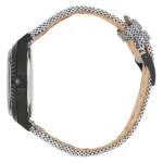 Side view of a stylish watch featuring a black bezel and a woven black-and-white strap, with a natural leather underside.