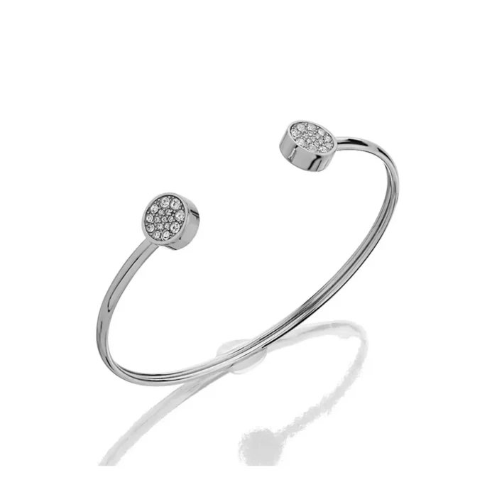 A sleek silver cuff bracelet with two round ends adorned with sparkling gemstones, reflecting light elegantly.