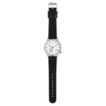 A minimalist watch featuring a white face, silver hour and minute hands, and a sleek black rubber strap.