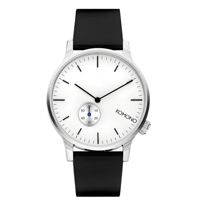 Silver-faced Komono watch with black strap, featuring minimalist design and a small sub-dial for seconds.