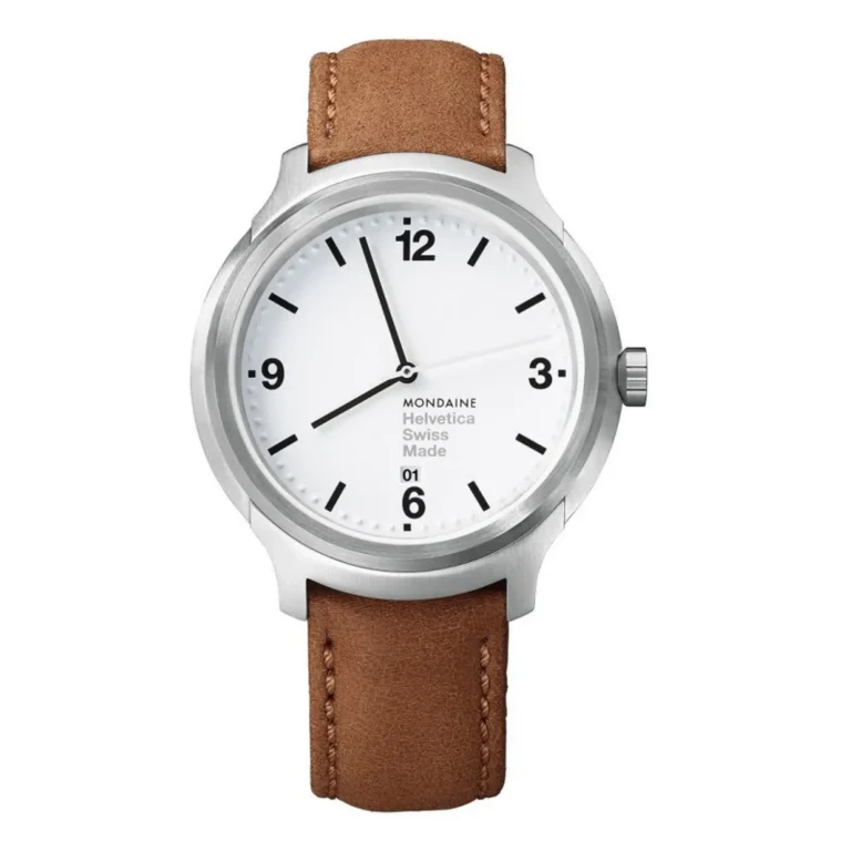 A sleek Mondaine Helvetica watch featuring a white dial, black hour markers, and a brown leather strap. Swiss made elegance.