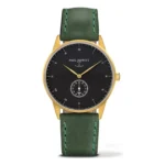 Elegant Paul Hewitt watch features a black dial, gold accents, and a green leather strap, showcasing a classic nautical design.